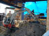 Dan working the backhoe2.JPG (53283 bytes)