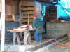 Jeff checks if window is in right place.JPG (53819 bytes)