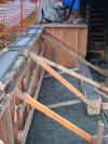 Retaining the retaining wall above.JPG (36312 bytes)