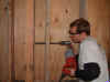 drilling holes for orange PEX.jpg (21008 bytes)
